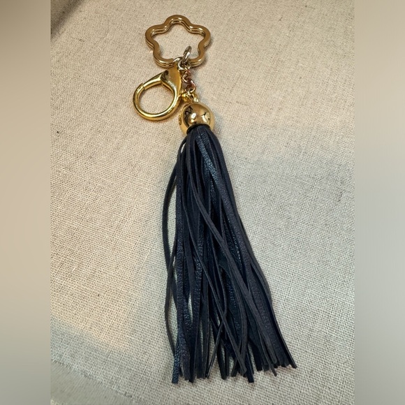 Black leather tassel key fob with gold tone quatrefoil charm - Picture 1 of 5
